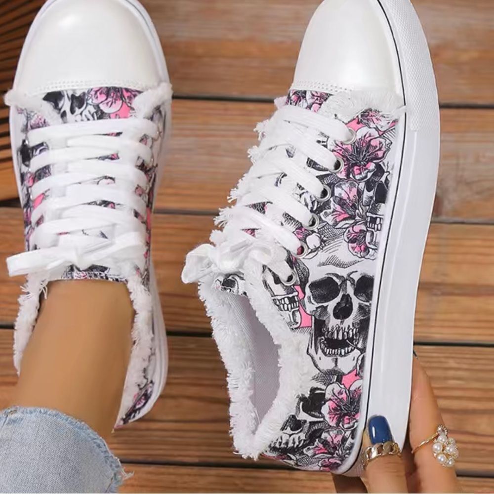 Skull Print Canvas sneakers, lace Up with raw trim to enhance the look.
